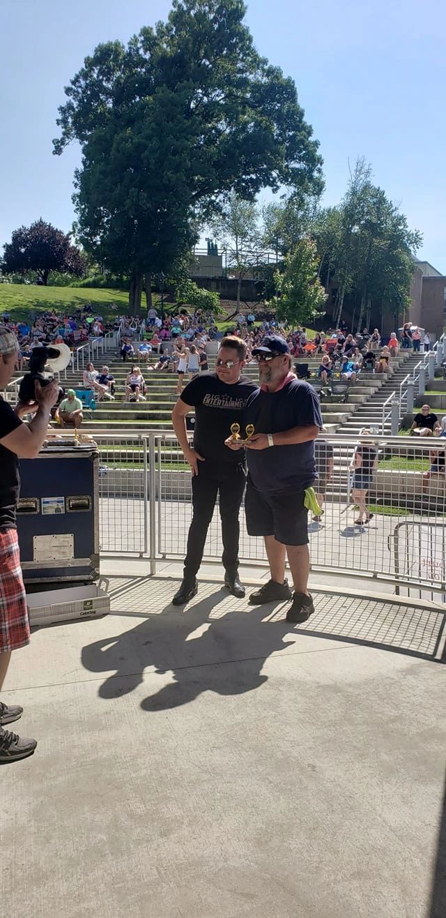 Outdoor amphitheater event with crowd