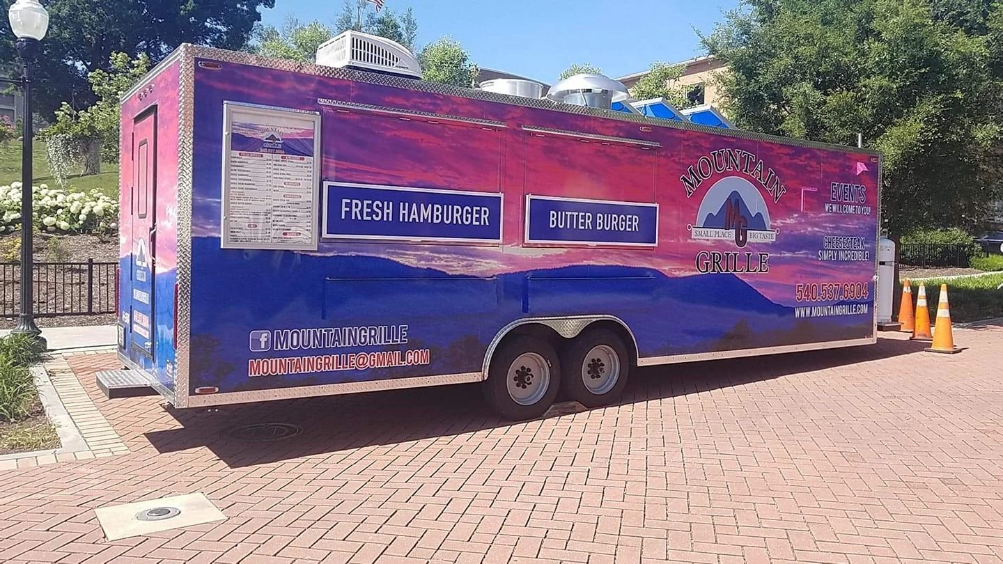 Mountain Grille food truck on brick plaza